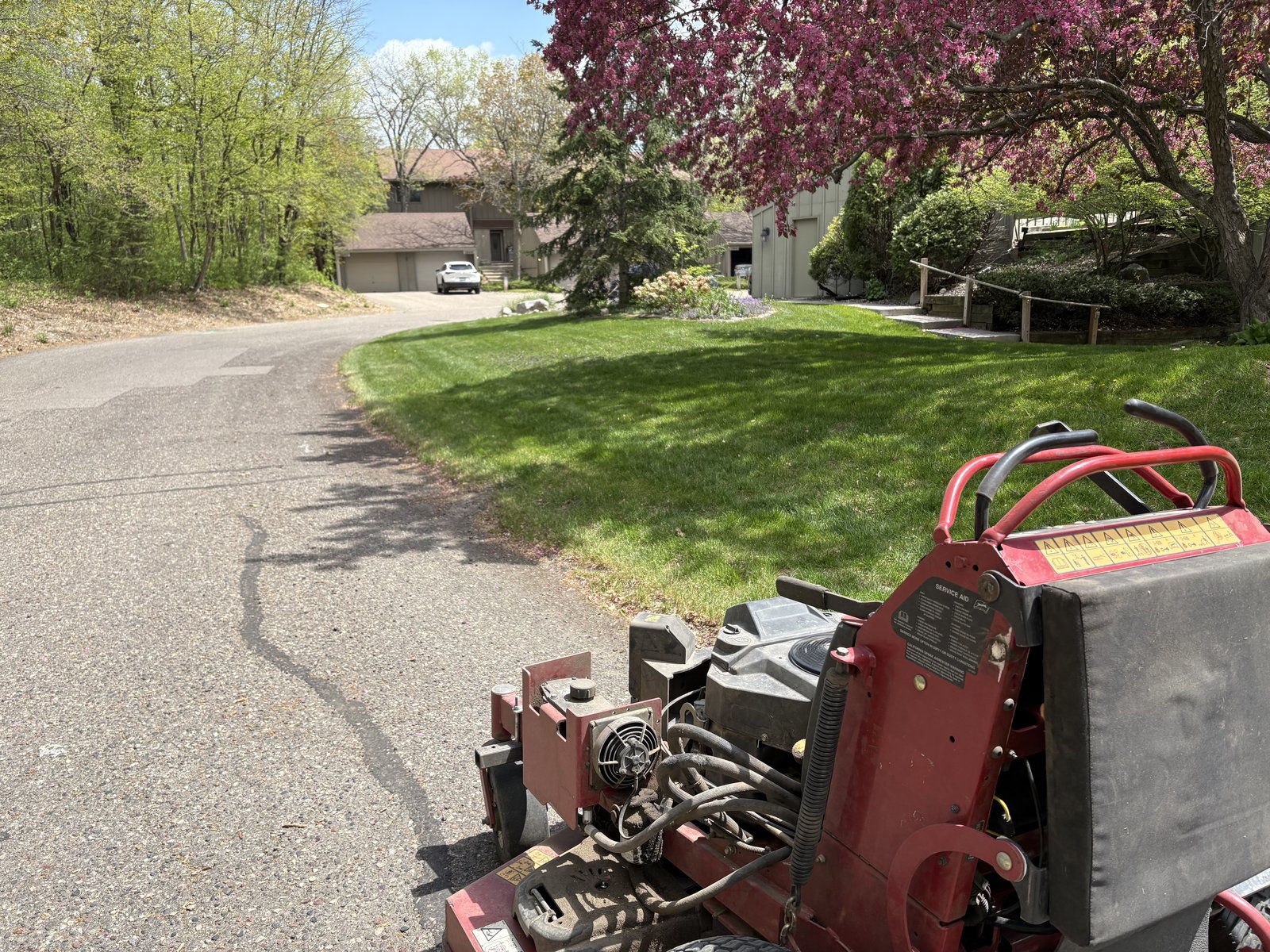 Toro mower on freshly cut lawn — Foss Noble Outdoor Services Plymouth MN